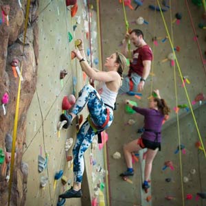 Students on the Climbing Wall at the Student Life Center