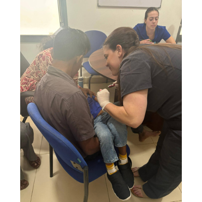 Child being fed at the clinic