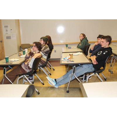 An absorbed Archaeology Club listens to their guest speaker