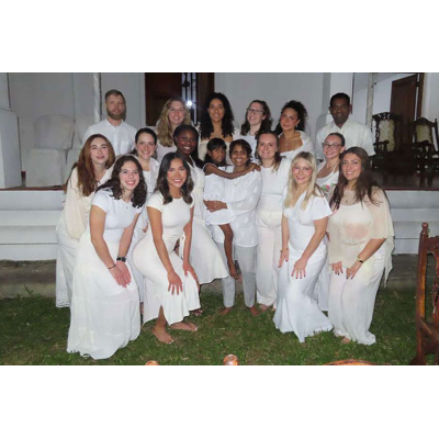 Students bought or brought white to take part in a Buddhist temple ceremony