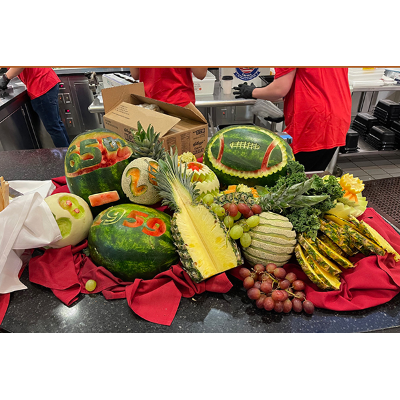 Fancy Cortaca-themed melons adorned food stations