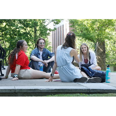 Attending an Orientation session outdoors.