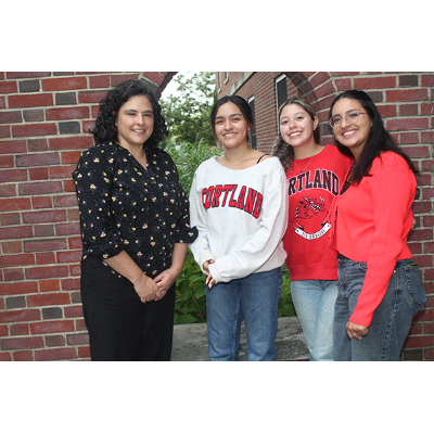 Pilar File-Muriel, left, with festival interns Asha, Lucila and Grace