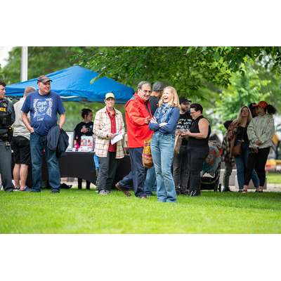 President Erik J. Bitterbaum, center, mingles