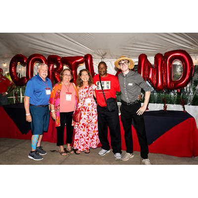 Friends reunite under the party tent