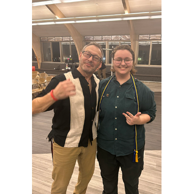 Ludwikowski, right, with high school theater director Gene Connor in 2024.