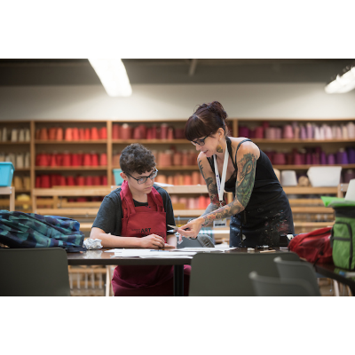 Student and professor in textile studio
