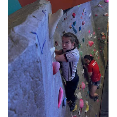 Climber Eyeing a Dynamic Move