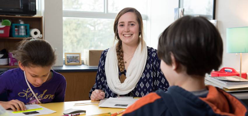 Student teacher in classroom with students