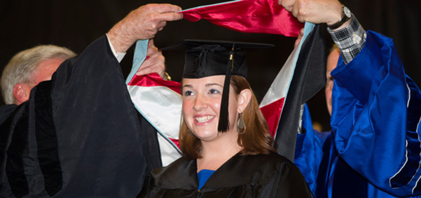 Education Leadership graduate receives hood at Graduate Commencement