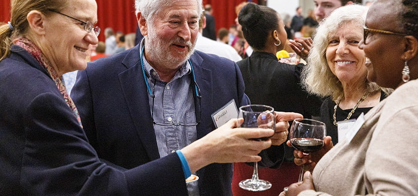 Donors toasting at the President's Circle Dinner
