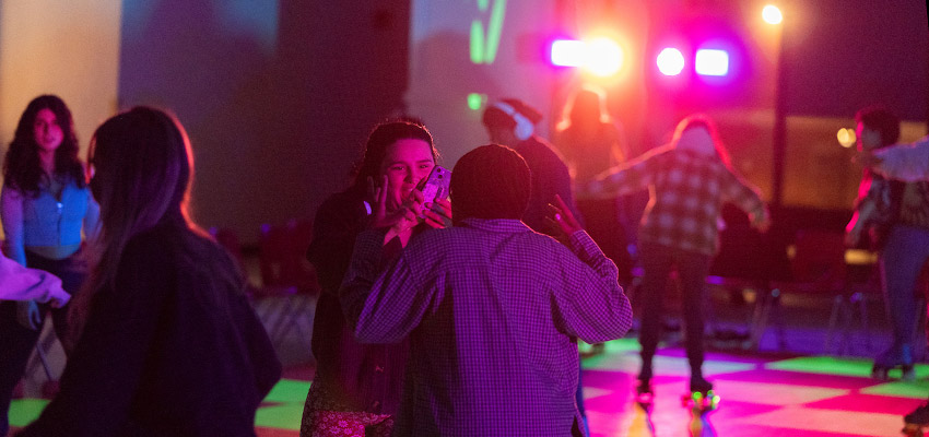Students rollerblading at a Cortland Nites event