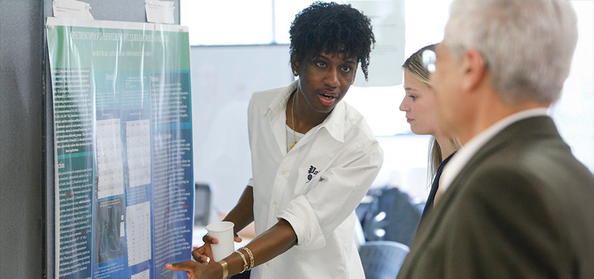 Students presenting their research at the Transformations Student Conference