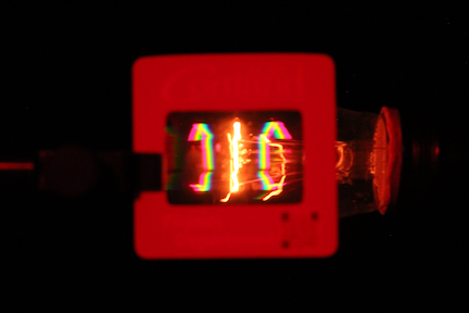 photo of the diffraction pattern from a incandescent bulb viewed from the side