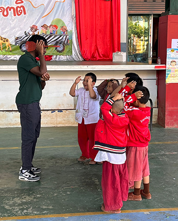 Students helping local students learn English