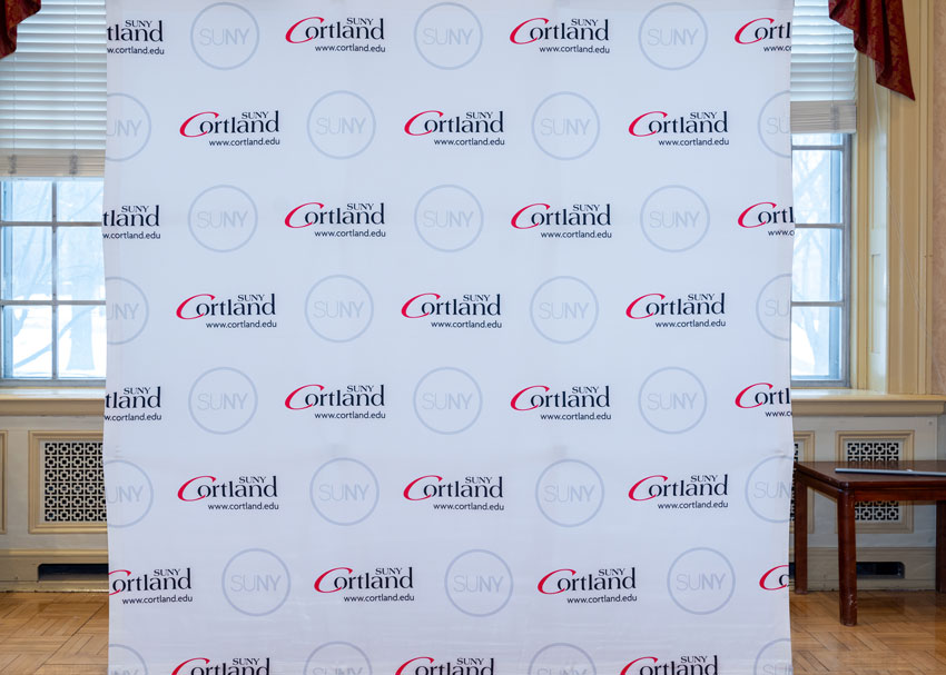 Primary Logo and SUNY Logo backdrop