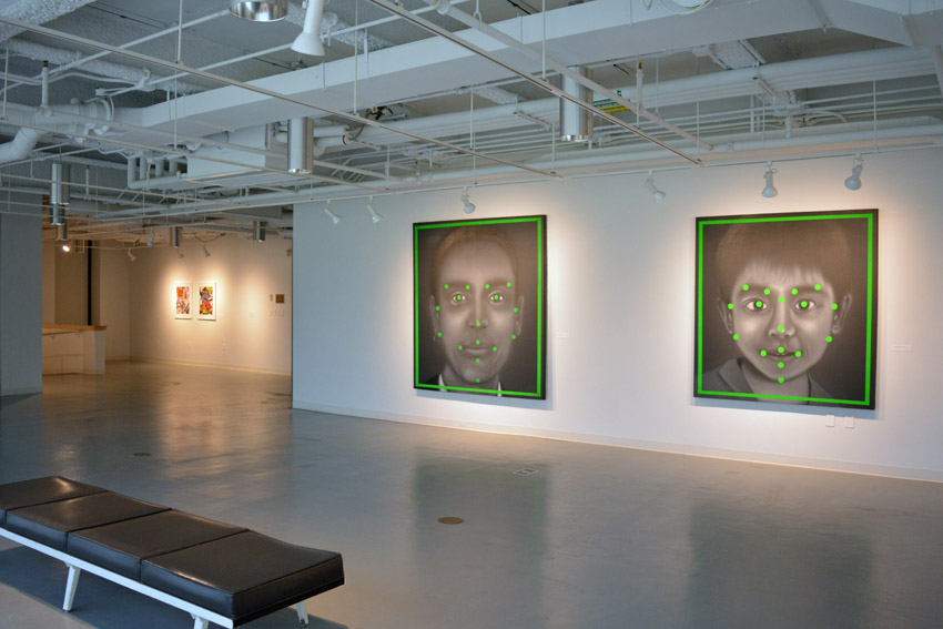 A view into the central gallery featuring works by the BFA candidates Stephen Buscemi and Samantha Reali.