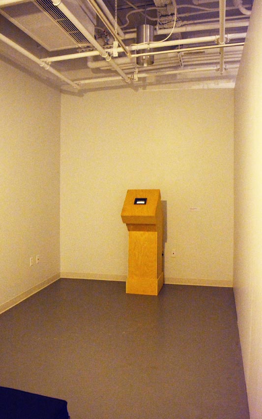 View into the east gallery at Dowd Gallery featuring sculptural objects produced by Buffalo-based sculptor Gary Sczerbaniewicz.   