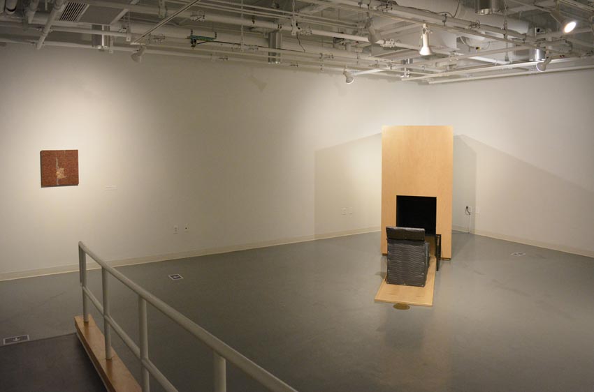 View into the west gallery at Dowd Gallery featuring sculptural objects produced by Buffalo-based sculptor Gary Sczerbaniewicz.   