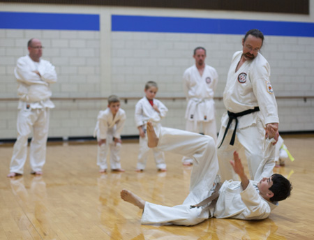 McAdams demonstrates his technique karate - group observation