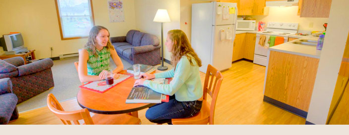 Two students in fully furnished West Campus Apartment